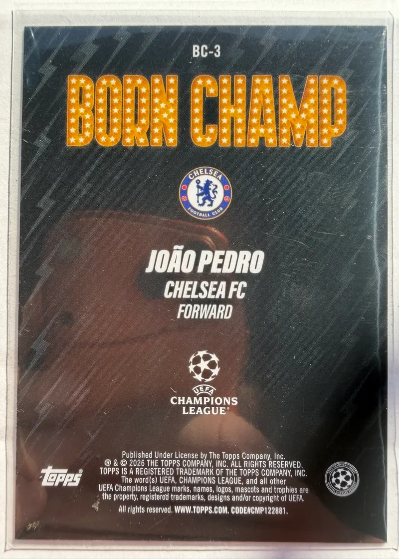 João Pedro, Topps UEFA Club Competitions 2025/26 Born Champ, karta BC-3 — rewers z herbem Chelsea, logo Ligi Mistrzów i nazwą podserii
