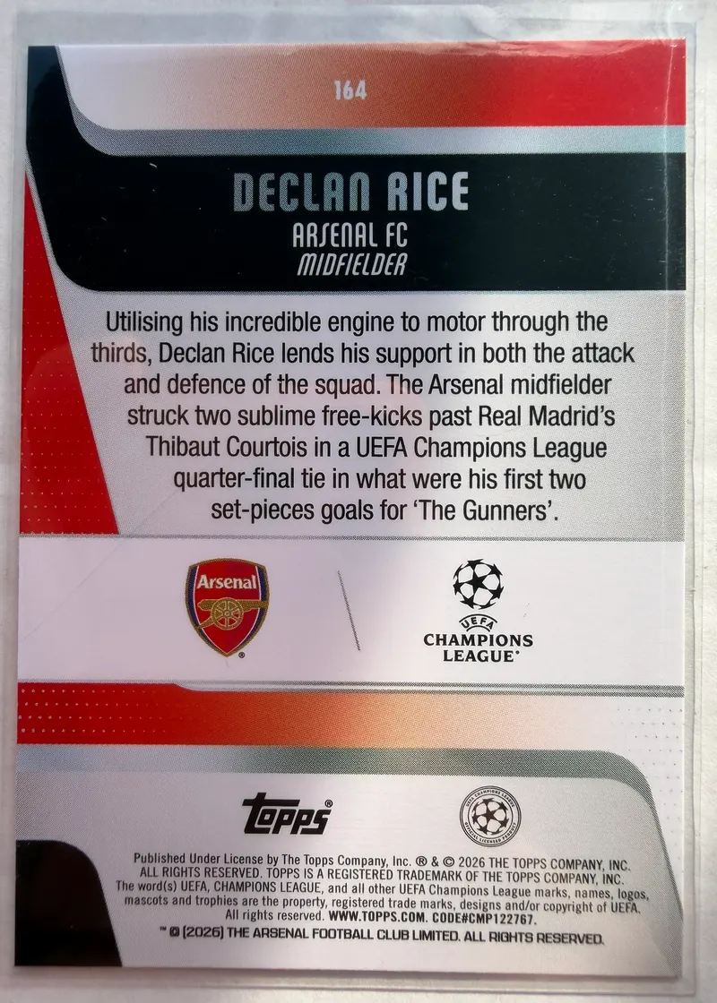 Declan Rice, Topps UEFA Club Competitions 2025/26, karta 164 — rewers z herbem Arsenalu, logo Ligi Mistrzów i opisem zawodnika