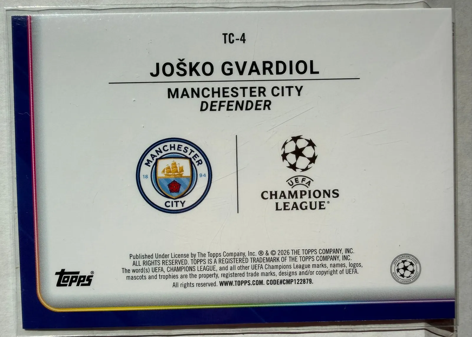 Joško Gvardiol, Topps UEFA Club Competitions 2025/26, karta TC-4 — rewers z herbem Manchesteru City i logo Ligi Mistrzów