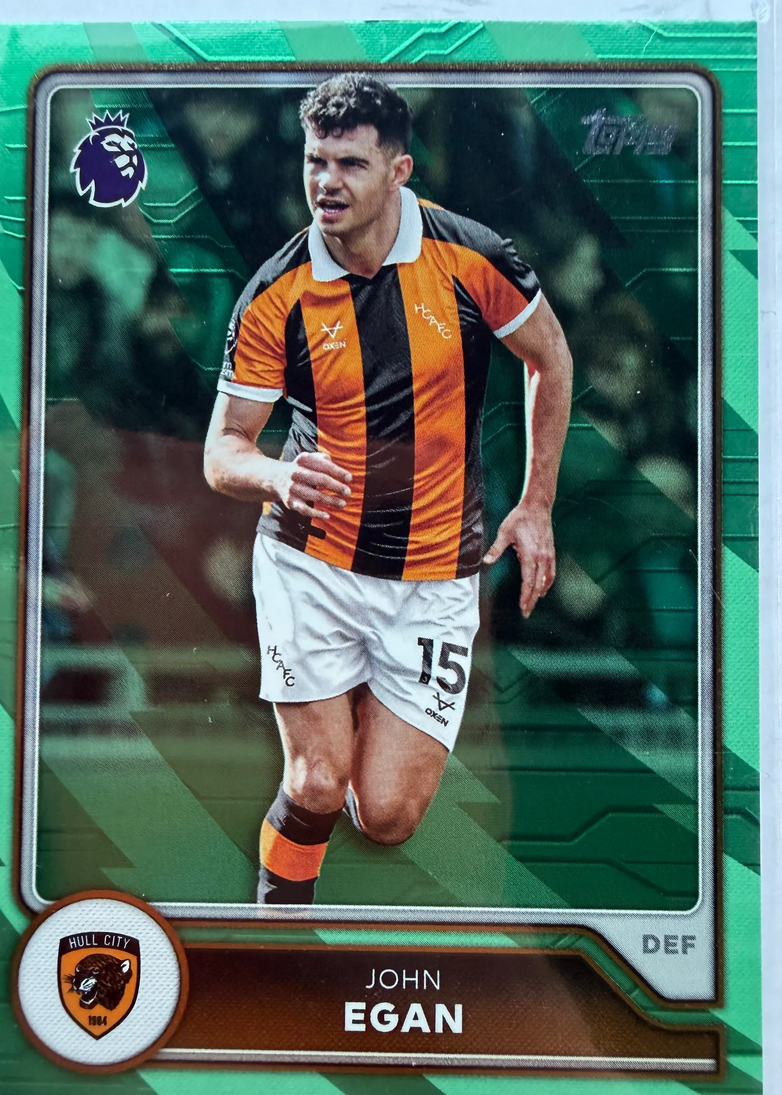 John Egan, Topps Premier League 2026/27 nr 287 Green Voltage — awers w barwach Hull City na zielonym tle